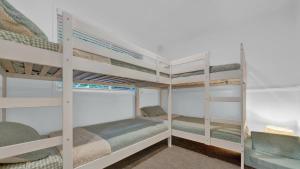 Ένα ή περισσότερα κρεβάτια σε δωμάτιο στο Relax Coastal Retreat Nth Avoca