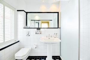 Koupelna v ubytování ARQ Paleis Hotel