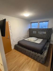 Giường trong phòng chung tại City-Loft am Rathaus Essen +15 ảnh