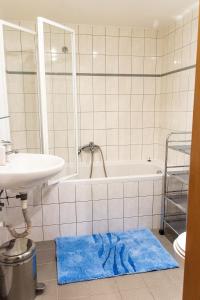 Ett badrum på Apartment Poustevník