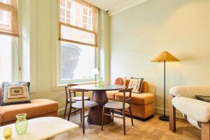 Posezení v ubytování ARQ Paleis Hotel