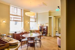 Posezení v ubytování ARQ Paleis Hotel