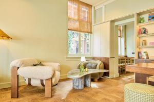 Posezení v ubytování ARQ Paleis Hotel
