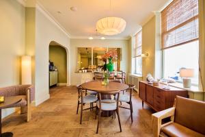 Posezení v ubytování ARQ Paleis Hotel