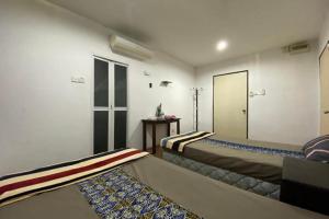 Posezení v ubytování OYO 90397 Rimba Lodge