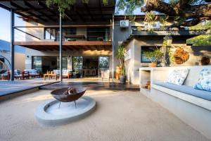 a house with a bowl in the middle of a living room at Rafiki Bush Lodge in Hoedspruit