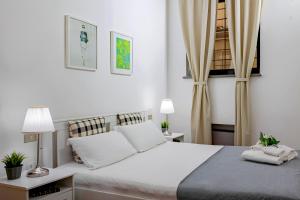 Posteľ alebo postele v izbe v ubytovaní Santa Croce Exclusive
