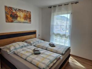Letto o letti in una camera di Happy Nest