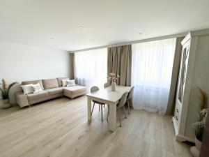 Posezení v ubytování WHITE APARTMENTS - Grunwaldzka