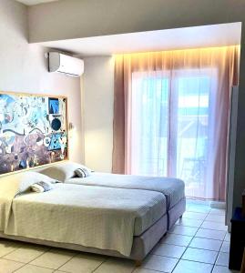 Letto o letti in una camera di Tree of Life Art Hotel