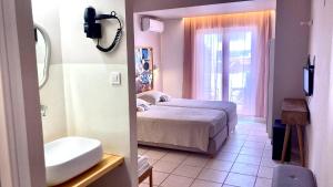 Letto o letti in una camera di Tree of Life Art Hotel