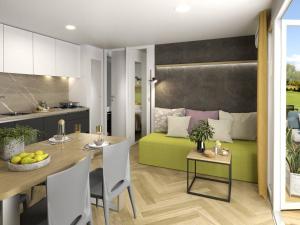 Uma área de estar em Camping Kozarica Mobile Homes