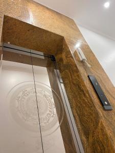 a glass table with a knife on top of it at New Sun Hotel in Dồng Văn