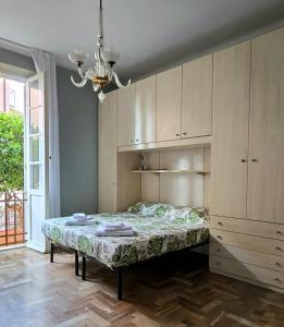 Postel nebo postele na pokoji v ubytování Lanfranco & Anna house