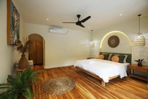 Voodi või voodid majutusasutuse Tiu Oasis Lombok toas