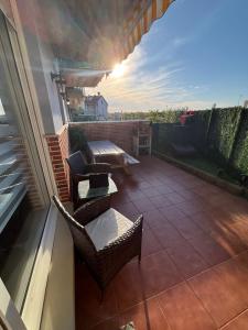 A balcony or terrace at El Pinar de Mogro atardeceres únicos