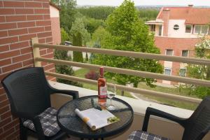 Balkón alebo terasa v ubytovaní Vita Apartmanok