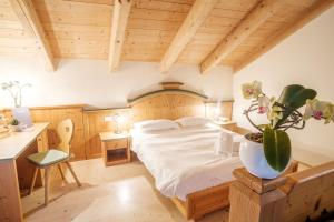 Un pat sau paturi într-o cameră la Casa Moresc
