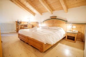 Un pat sau paturi într-o cameră la Casa Moresc