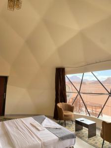 Voodi või voodid majutusasutuse Martian landscape camp toas