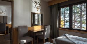 Postel nebo postele na pokoji v ubytování Lapland Hotels Hetta