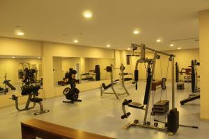 a gym with several exercise equipment in a room at Arena Hotel Yardimli in Kabakhdibi