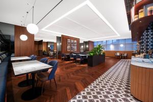 Гостиная зона в Intercity Hotel Shanghai City Center - Free Mini Bar