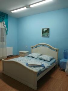 Postel nebo postele na pokoji v ubytování BB Student Hotel Khust