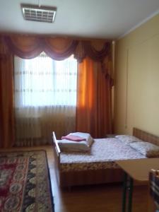Postel nebo postele na pokoji v ubytování BB Student Hotel Khust