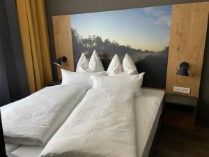 Postel nebo postele na pokoji v ubytování Hotel Kitz ehemals Schlemmerhütte