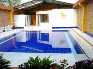 Bazén v ubytování Hotel Tropico Real Mesitas nebo v jeho okolí