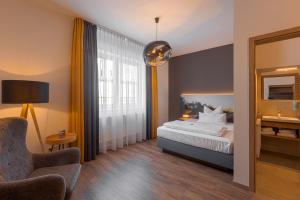 Postel nebo postele na pokoji v ubytování Hotel Kitz ehemals Schlemmerhütte