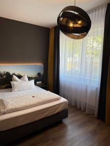 Postel nebo postele na pokoji v ubytování Hotel Kitz ehemals Schlemmerhütte