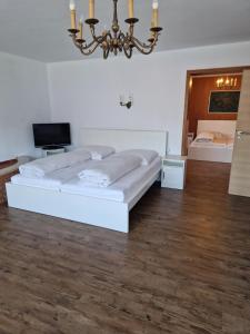 Katil atau katil-katil dalam bilik di HOTEL WALDHORN