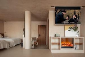 TV a/nebo společenská místnost v ubytování Seven Letters Preface Hotel + 37 fotografií