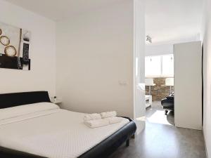 Postel nebo postele na pokoji v ubytování PANORAMIC D-LUXE