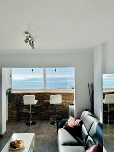 Posezení v ubytování PANORAMIC D-LUXE + 14 fotografií