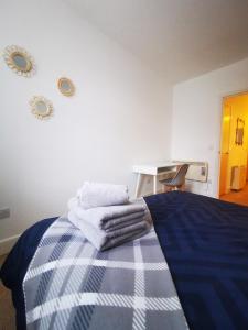 Postel nebo postele na pokoji v ubytování Stevenson Apartment in Oban City