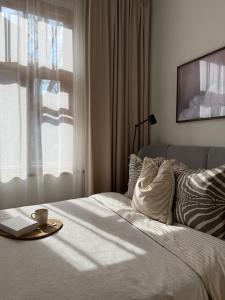 Ένα ή περισσότερα κρεβάτια σε δωμάτιο στο Central Tallinn apartment, Boho Gem