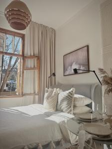 Μια τηλεόραση ή/και κέντρο ψυχαγωγίας στο Central Tallinn apartment, Boho Gem