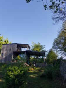 Κήπος έξω από το Le petit paradis, mini maison,nature,confort,calme