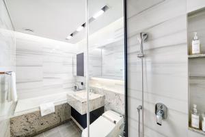 Vannas istaba naktsmītnē New CZ LCT Residence