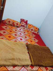 Postel nebo postele na pokoji v ubytování Independent homestay