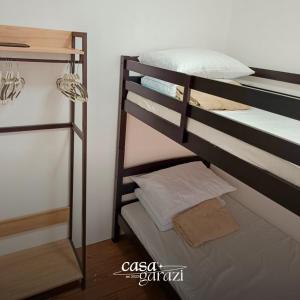 a couple of bunk beds in a room at Casa Garazi in Calo