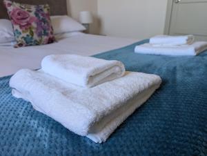 En eller flere senge i et værelse på Eastgate Lodge Flat 23B + 43 billeder