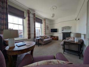 Et opholdsområde på Eastgate Lodge Flat 23B