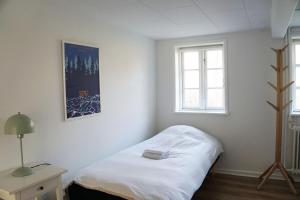 En eller flere senge i et værelse på Molslaboratoriet - Stuehuset