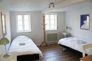 En eller flere senge i et værelse på Molslaboratoriet - Stuehuset