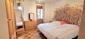 A bed or beds in a room at Accommodation Madre Amada Tenerife
