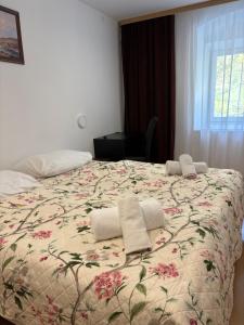 Llit o llits en una habitació de Gasthof Durigon